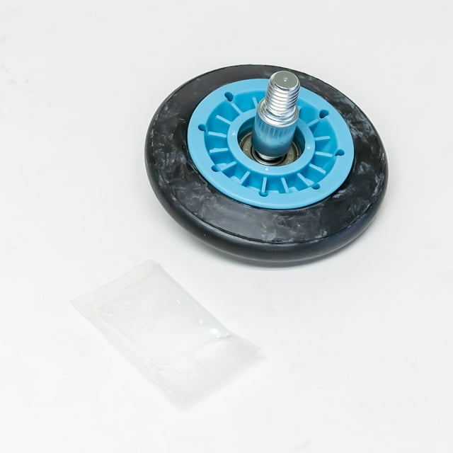 DE16782E dryer drum roller and shaft with ball bearing